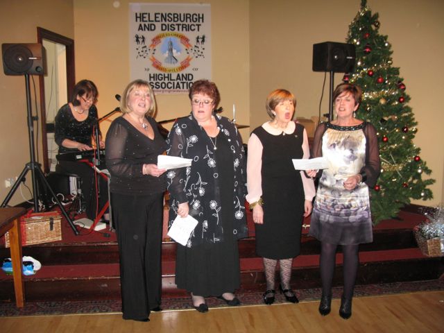 Members of the Dalvait Singers led the hall in some traditional Carols