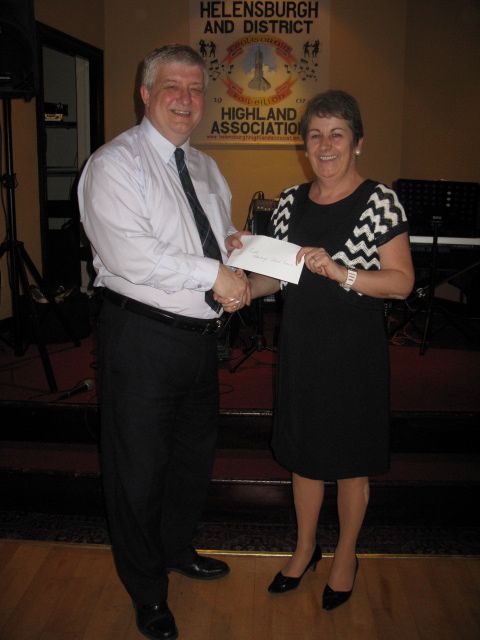 Joan Milroy from 'Enable' Receives £500 Donation